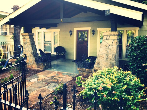 Gated entrance way to front porch