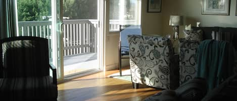 Large Living Room Space...two seating areas with view and deck
near kitchen.