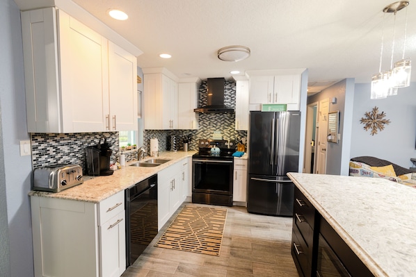 Open plan kitchen with breakfast island