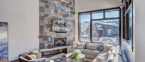 Floor to ceiling windows allow you to take in the incredible mountain views- Breckenridge Vacation Rental