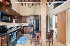 Full kitchen with standard coffee maker.