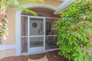 Front screened-in porch.