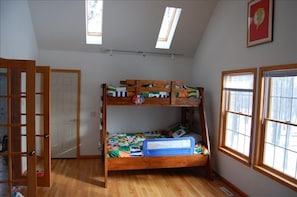 one of the upstairs bedrooms/playroom
