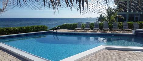 First floor, end unit, direct oceanfront.  Easy access to the beach and pool.