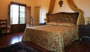 The bedroom in the tower of the villa