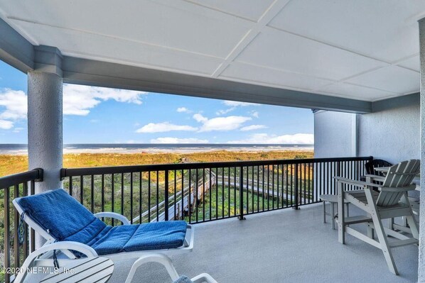 Large oceanfront patio off living area and master