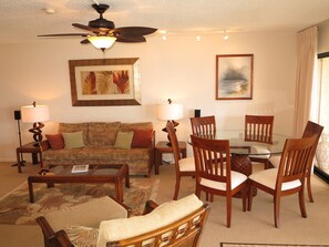 Living room with sofa pullout and dining area