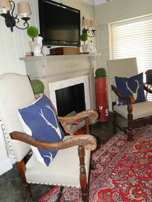 Living Area with flat screen television and electric fireplace