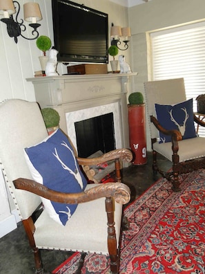 Living Area with flat screen television and electric fireplace