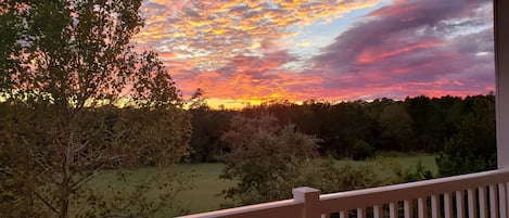 Sunset from back deck looking onto 9th fairway of Normann Course,.