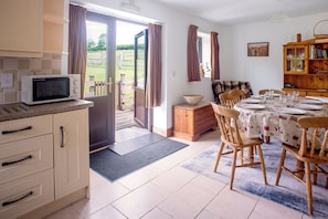 Step free access to decking area from dining room/kitchen. With private garden