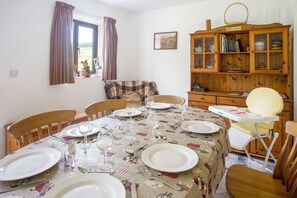 seats 8 with under table access for wheelchair. High chair on request (free)