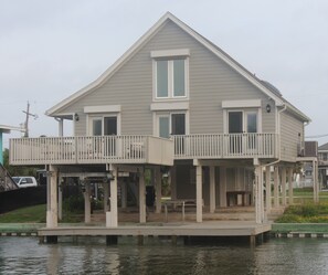 Canal house - ideal for fishing downstairs on the dock and enjoying the breeze.
