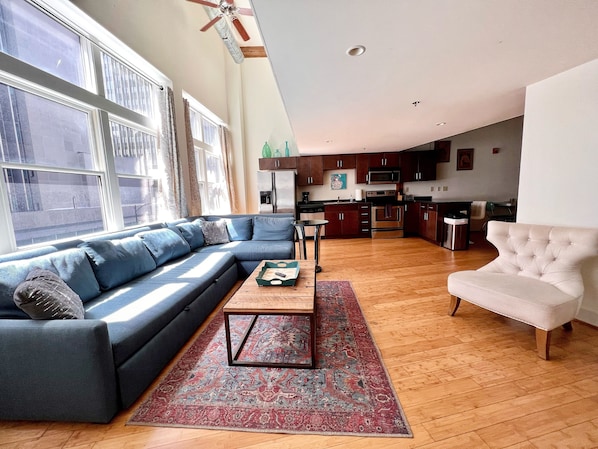 Spacious living room with queen sleeper sofa.