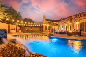 Complimentary heated pool with neon led pool lighting.