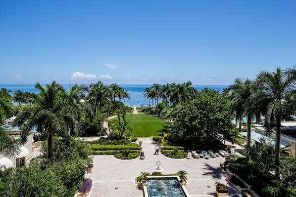 View of ocean, great lawn and fountain from balcony