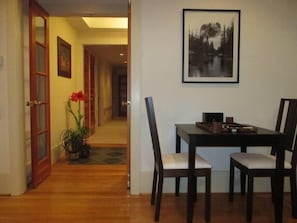 Looking down the generous hallway to the bedroom wing. Lap top or game table in great room.