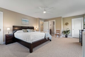 Primary bedroom - king bed,  with full private bath, crib, and walk in closet.