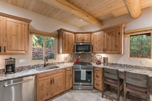The modern and welcoming kitchen, with sleek appliances