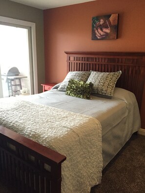queen size bed, patio door