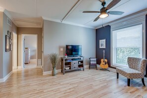 Living room, looking into hallway and bedroom