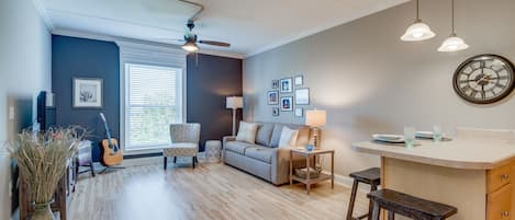 Living room from foyer. Lots of light from large window.Beautiful downtown view.