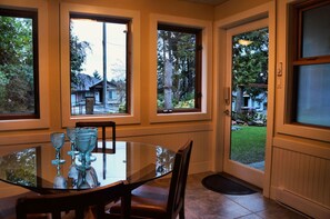 Eat in sun porch overlooking the garden