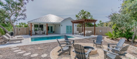 Bid-A-Wee Beach Bungalow | Private Backyard (Heatable*) Pool and Lounge Area | Outdoor Dining & Grilling Space