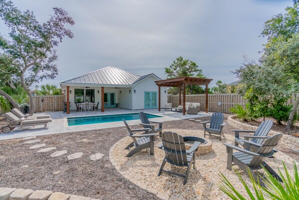 Bid-A-Wee Beach Bungalow | Private Backyard (Heatable*) Pool and Lounge Area | Outdoor Dining & Grilling Space