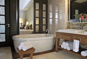 Full bathrooms include a tub and large shower.