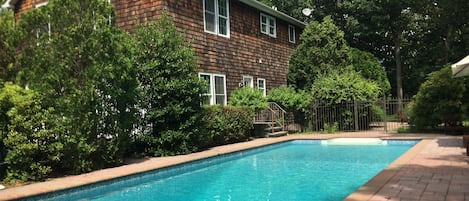 Heated 40ft saline pool and deck in separate secure fenced area with all day sun