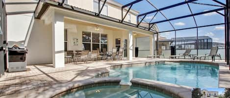 Enjoy the pool and spa hot tub available under a covered lanai