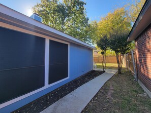 Walk-way to back yard from front gate