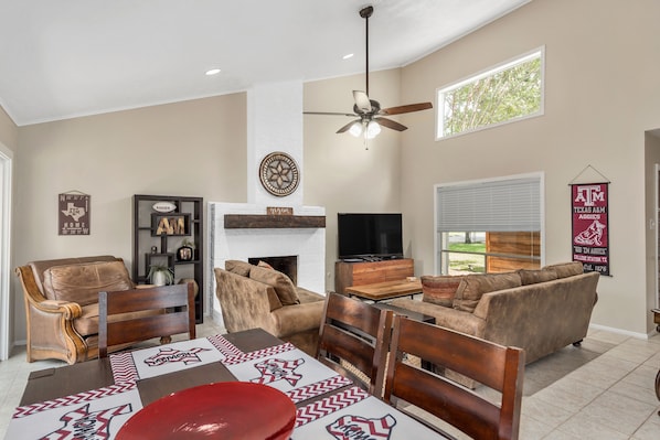 2 Living Areas, A&M Themed home, 4 SMART TV's, Open Concept layout