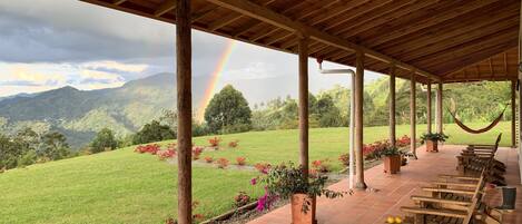 View from the 3m wide porch. Magical rainbows are visible most days!