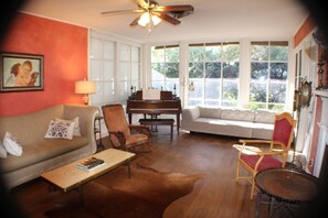 Couches and Cow Hide Rug