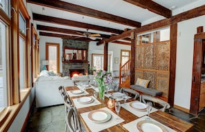 Another view of our dining/living room, looking past our custom made Asian-inspired decorative screen.
