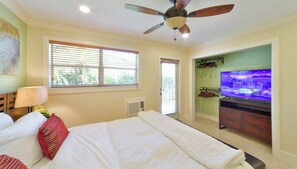 Suite #2 - Queen Bedroom with TV and Door to Terrace