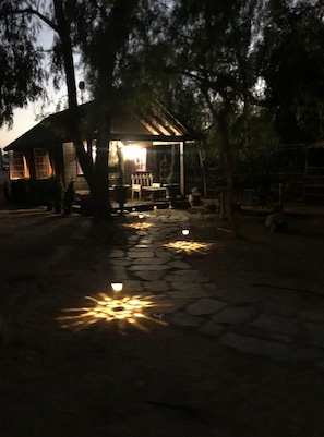 Main cottage at night.