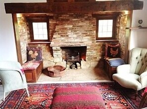 Play cards or chat around the fireplace