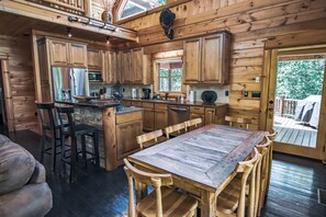 Dining Area & Kitchen Beside Grill & Outdoor Seating