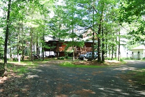 View of cabin as you drive in, circle driveway