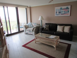 Living room area by patio door.