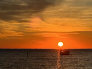 Sunrise on Core Sound with Davis Shore Ferry crossing. 