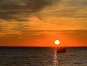 Sunrise on Core Sound with Davis Shore Ferry crossing.