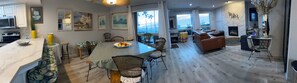 Pano shot of kitchen counter, dining and living rooms