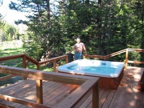 Spa overlooking mountain meadow