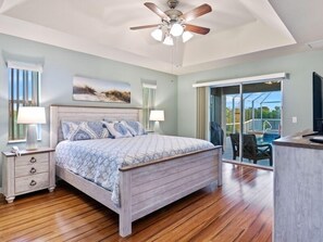 Master bedroom suite overlooking pool 