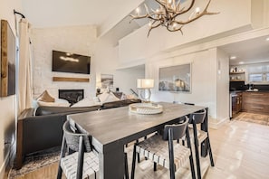 Gather around the elegant dining table for meals, games, or great conversation—perfect for everything from cozy breakfasts to celebratory dinners with friends and family.