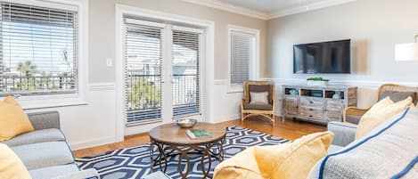 Brass Rail 306 Living Area with Sleeper Sofa and Flat-screen TV